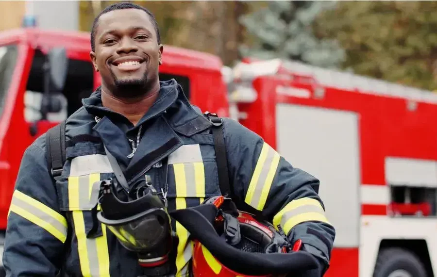A fireman posing after a care home fire evacuation.