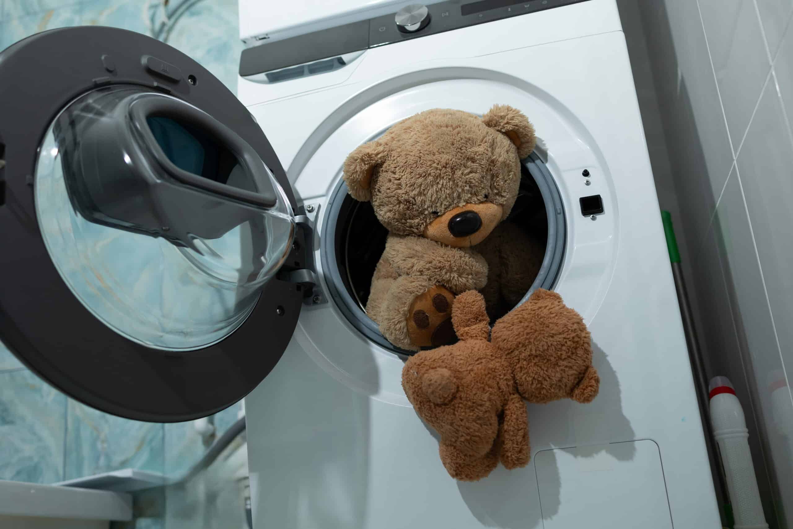 commercial tumble dryers in a professional laundry room