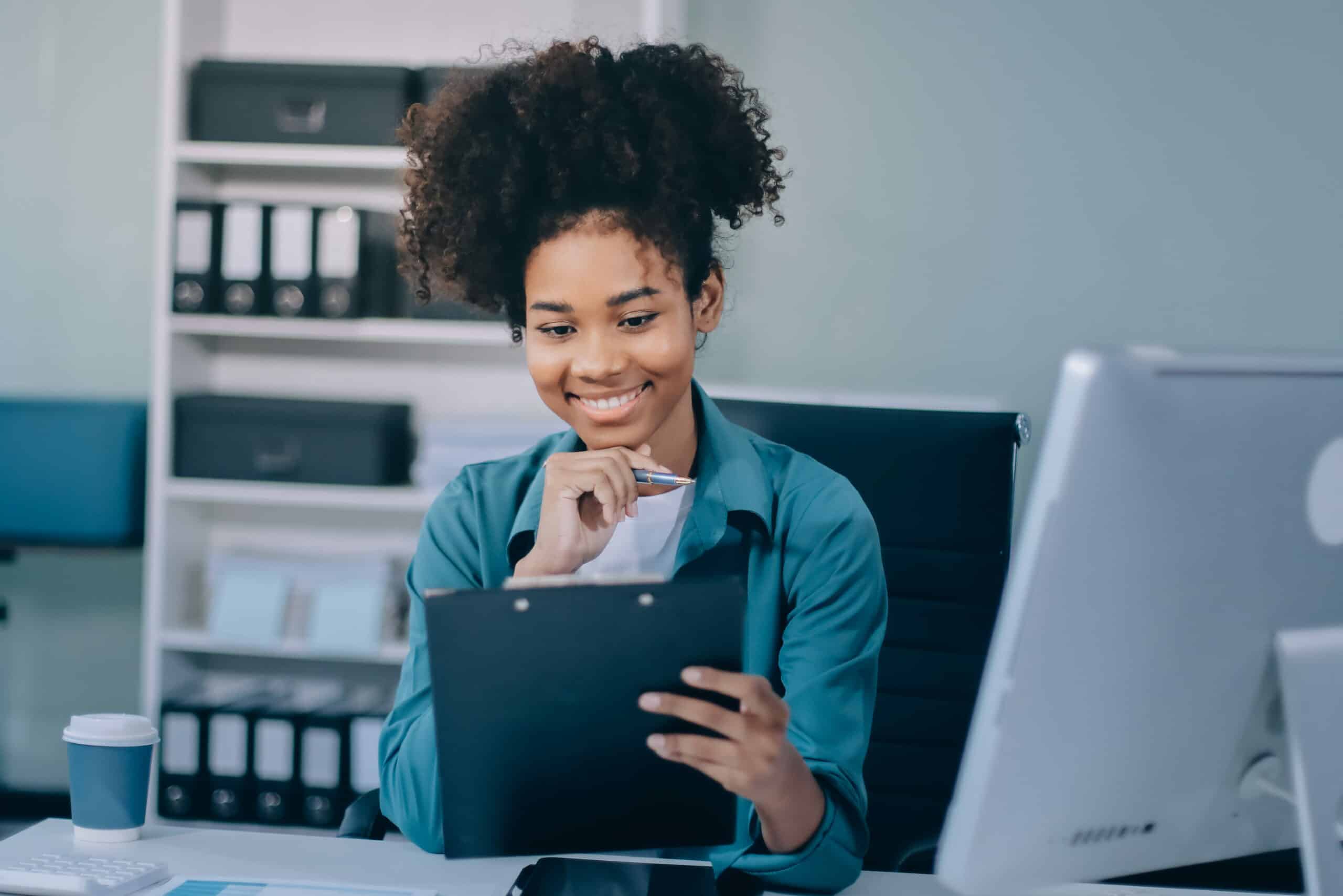 Cleaning audit checklist manager reviewing cleaning records and operational cleaning documentation